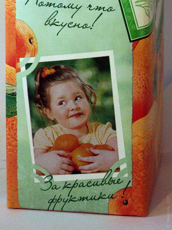Фото девочки с упаковки апельсинового сока «Фруктовый сад»